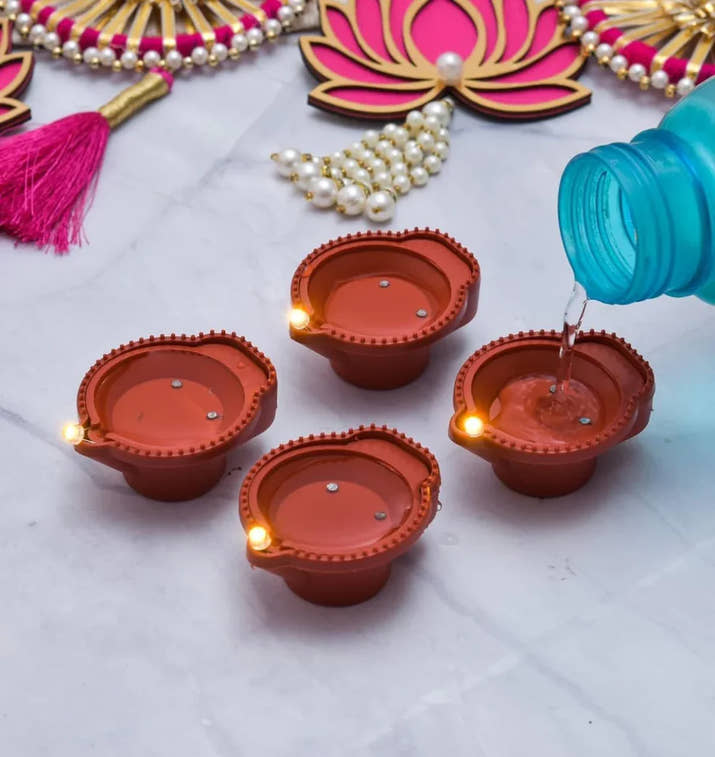 Water Sensor LED Diya  BUY 1 PACK OF 6 PCS AND GET 1 PACK OF 6 PCS FREE